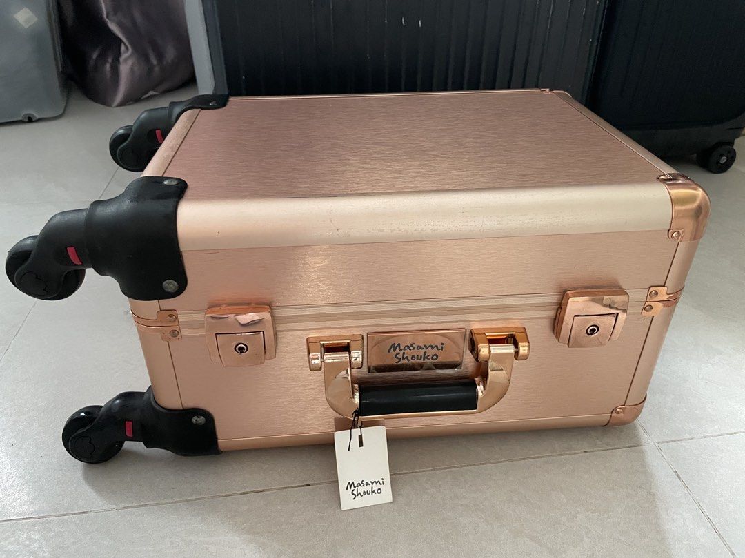 MAKEUP CASE (Category: Art & Prints) located in Singapore. Submitted by orchidlatte (Listing ID 1458936092, Image 1). Description: - Stylish rose gold makeup case - Features smooth-rolling wheels for easy portability - Reinforced corners for durability - Ideal for organizing makeup and beauty products - Elegant and practical design.
