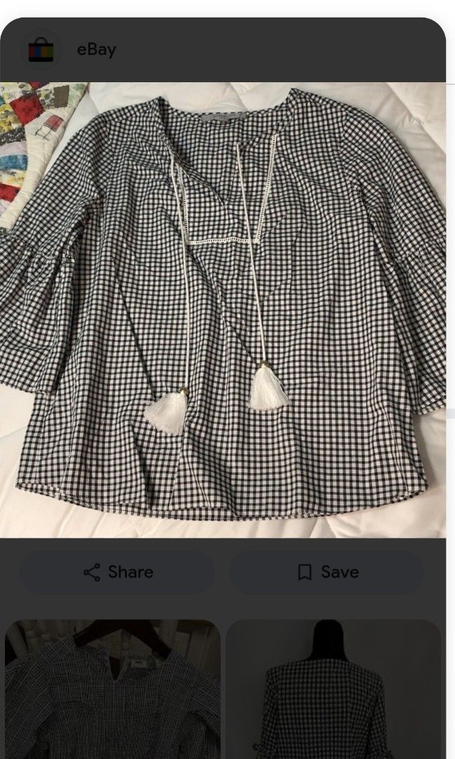 Marc New York Blouse (Category: Blouses) located in Mandaluyong City. Submitted by miyakiko (Listing ID 1458927656, Image 2). Description: Marc New York black and white gingham bell-sleeve blouse with front tassel ties. Good as new, size M -L, selling for P150.