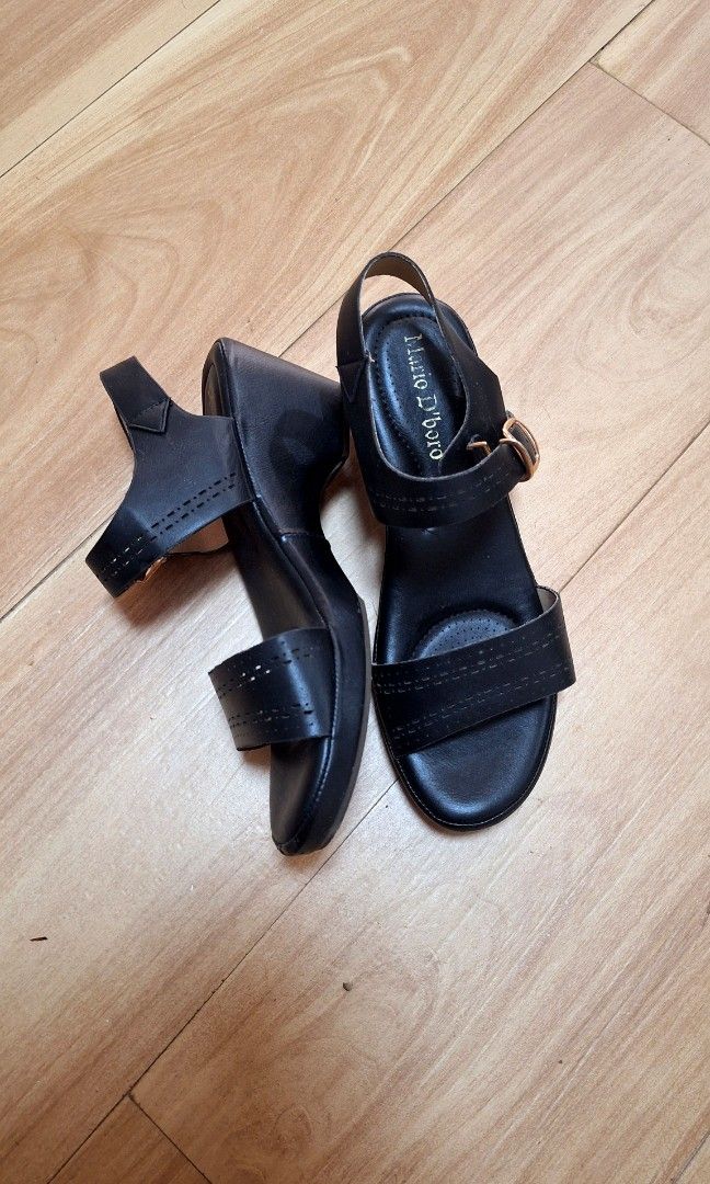 Mario D'boro Wedge Sandals (Category: Flats & Sandals) located in Quezon City. Submitted by tinylittlecorner (Listing ID 1459052402, Image 3). Description: Mario D'boro wedge sandals, black. Size 39. Comfortable and stylish with perforated straps and gold buckle. decluttering mom's closet. she'll all about comfort and this one is super light too.