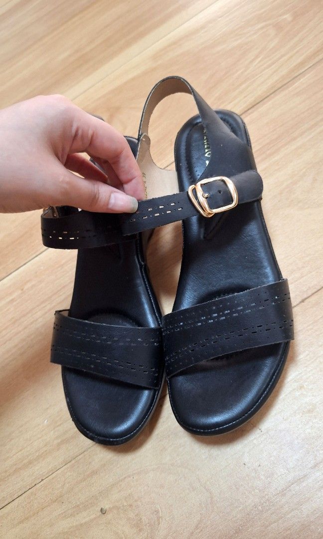 Mario D'boro Wedge Sandals (Category: Flats & Sandals) located in Quezon City. Submitted by tinylittlecorner (Listing ID 1459052402, Image 2). Description: Mario D'boro wedge sandals, black. Size 39. Comfortable and stylish with perforated straps and gold buckle. decluttering mom's closet. she'll all about comfort and this one is super light too.