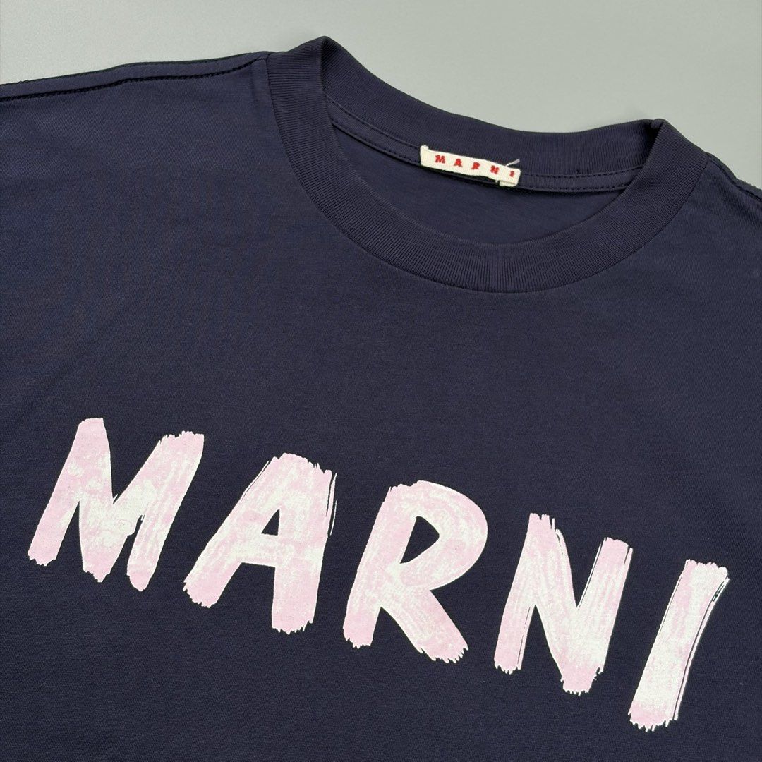 (Sale)Marni (Category: Luxury Apparel) located in Cavite. Submitted by onebeancent (Listing ID 1459087462, Image 3). Description: 🔘M4.rni Logo Tee Size: Large to Semi XL Dimension: 22" Width | 27" Length Color: Navy Blue Color Rate: 10/10 Issue: None Condition: Good as new‼️ Before: 1,250php Now: 950php Additional Shipping Fee (J&T Small Pouch) 75php Luzon 100php visayas 120php mindanao.