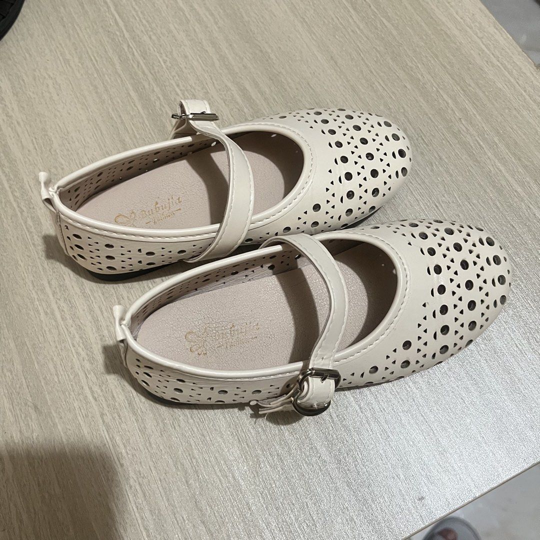 Mary Jane Doll Shoes (size 31) (Category: Babies & Kids Fashion) located in Quezon City. Submitted by forsaleniangel (Listing ID 1459011115, Image 3). Description: Size 31 Cream color Cute cut-out design Secure strap with buckle closure Perfect for everyday or special occasions Easy slip-on and off Rfs: declutter.