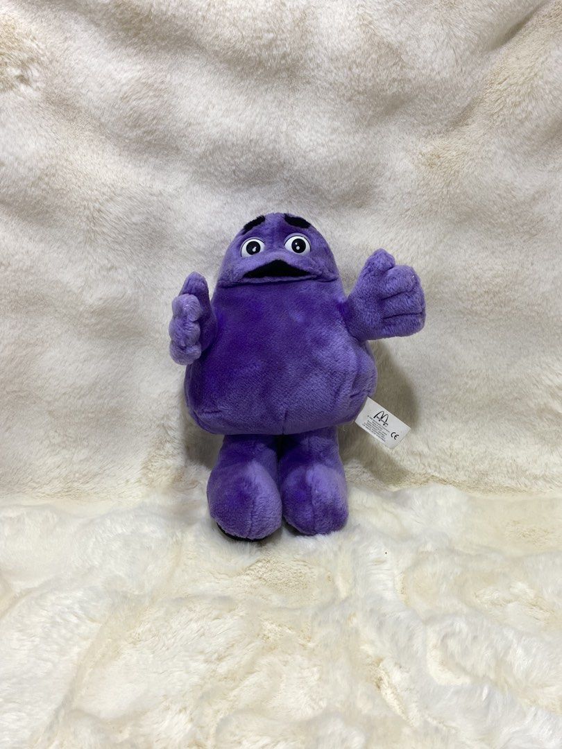 McDonald's Grimace Plush Toy (Category: Plushies & Soft Toys) located in Kalibo. Submitted by ollie_stuffshop (Listing ID 1458910851, Image 1). Description: 28cm x 16cm Before you send your inquiries: ❗️Last Price is already posted ❗️Manage your expectations, WYSIWYG ❗️May need washing ❗️Dropoff is every Wednesday & Sunday - Adorable Purple Grimace plush toy - Made of soft, cuddly material - Approximately 8 inches tall - Ideal for collectors and 