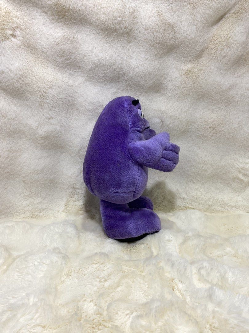 McDonald's Grimace Plush Toy (Category: Plushies & Soft Toys) located in Kalibo. Submitted by ollie_stuffshop (Listing ID 1458910851, Image 2). Description: 28cm x 16cm Before you send your inquiries: ❗️Last Price is already posted ❗️Manage your expectations, WYSIWYG ❗️May need washing ❗️Dropoff is every Wednesday & Sunday - Adorable Purple Grimace plush toy - Made of soft, cuddly material - Approximately 8 inches tall - Ideal for collectors and 