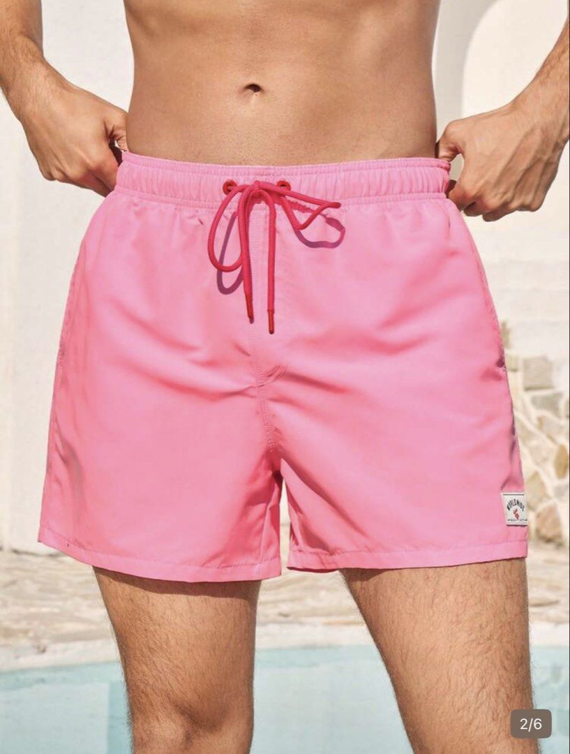 Men’s Beach Short (Category: Swim Trunks & Board Shorts) located in Baguio. Submitted by harley_hq (Listing ID 1458917208, Image 1). Description: - Pink swim trunks - Drawstring waist - Small Billabong logo tag on the side - Perfect for beach or pool - Comfortable fit.