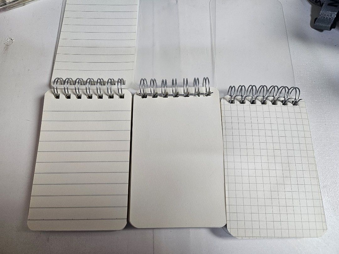 Mini notepad set (Category: Stationery & School Supplies) located in Pasig City. Submitted by purplewingsph1 (Listing ID 1459088735, Image 2). Description: - Set of 3 mini notepads - Features lined, blank, and grid pages - Spiral-bound for easy flipping - Compact and portable design - Ideal for notes, lists, and planning PAYO Only. Strictly no COD. (Please view my Carousell profile for proof of legitimacy: purplewingsph1) Mode of payment: Gcash, 