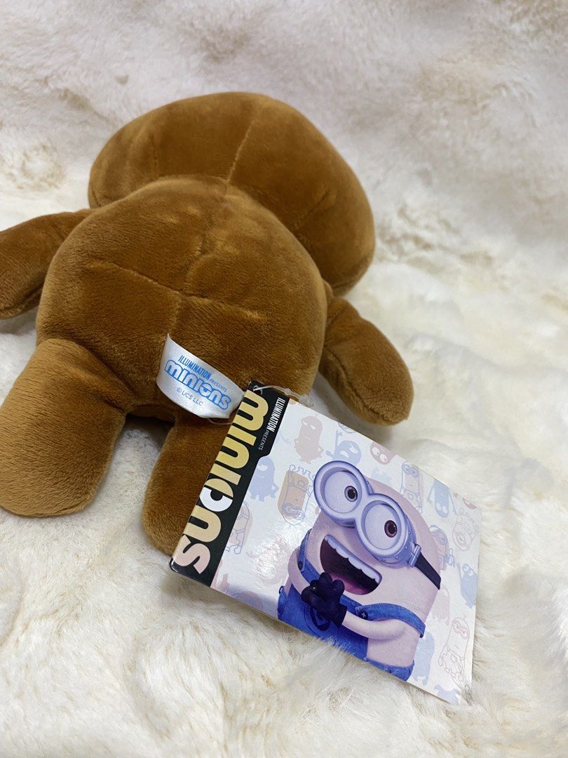 Minions Teddy”Tim” Bear Plush Toy with Hat and Bowtie (Category: Plushies & Soft Toys) located in Kalibo. Submitted by ollie_stuffshop (Listing ID 1458888973, Image 3). Description: 28cm x 18cm Before you send your inquiries: ❗️Last Price is already posted ❗️Manage your expectations, WYSIWYG ❗️May need washing ❗️Dropoff is every Wednesday & Sunday - Adorable brown teddy bear plush toy. - Features a cute pink hat and pink bowtie. - Comes with an a
