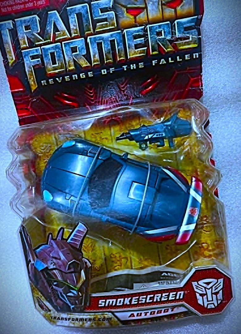 MOC ROTF SMOKESCREEN Hasbro Deluxe Class Autobot Transformers (Category: Action & Battle Toys) located in Pasay City. Submitted by Chariselyn (Listing ID 1459052778, Image 1). Description: MOC ROTF SMOKESCREEN (1,800+sf) Hasbro Deluxe Class Autobot Transformers Series: Movie - Revenge of the Fallen, 2009 Scale: 6 inches Stock: 1 Box Condition: 7/10 Issues: 0 Accessories: complete Mode of Payment: GCash or through your rider Shipping options: Paym