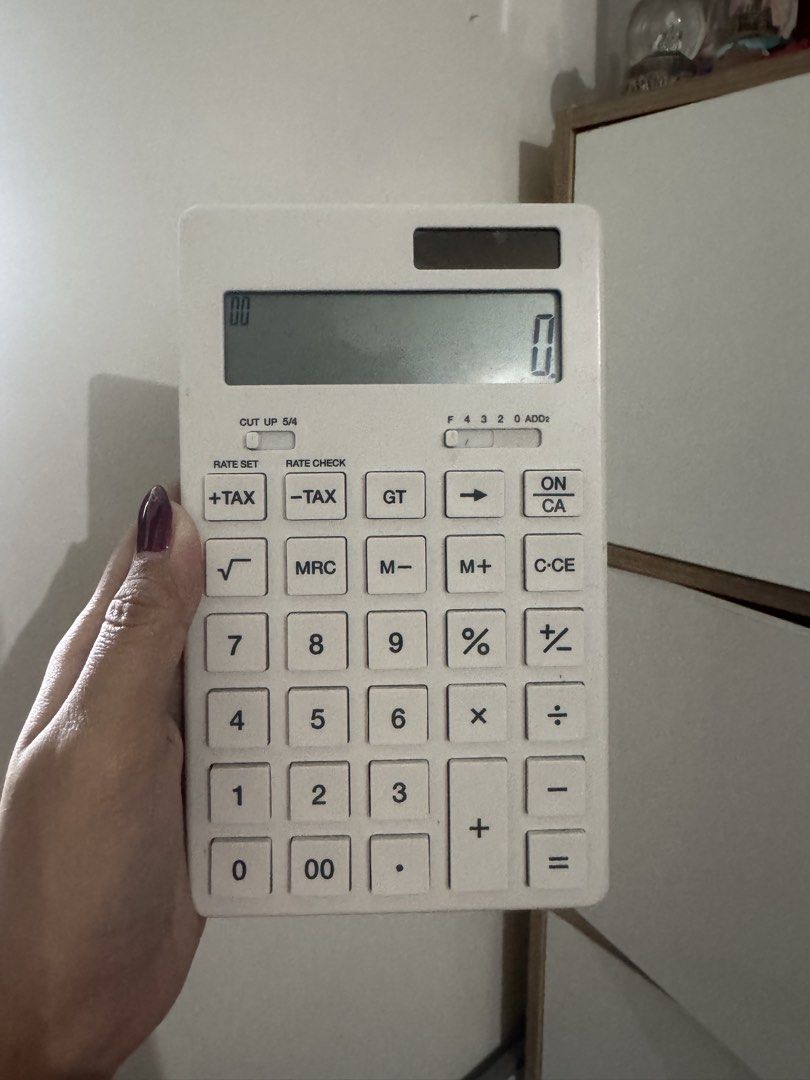 MUJI Calculator original (Category: Stationery & School Supplies) located in Manila. Submitted by redvelvetcheesecake13 (Listing ID 1458906352, Image 1). Description: - Original muji calculator bought at MOA - Used only one or twice for school - Perfect condition .