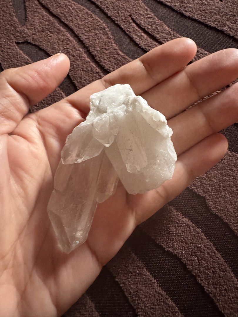 Natural Raw Clear Quartz Crystal Cluster Specimen (Category: Other Home Decor) located in Las Pinas. Submitted by emdjss (Listing ID 1458904417, Image 3). Description: - Beautiful natural clear quartz cluster - Features multiple points and a raw base - Ideal size for shelf or desk display - Great for crystal collectors or decorative purposes - Boasts lovely clarity and unique natural formations Selling this beautiful, 100% natural raw Clear Quart