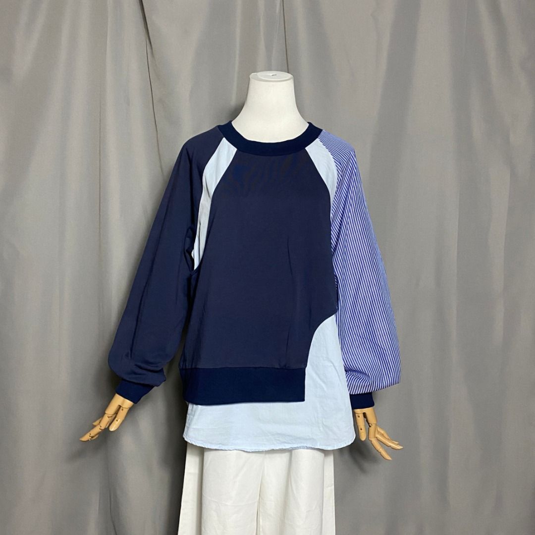 Navy blue and light blue layered-style patchwork sweatshirt with one striped (Category: Longsleeves) located in Las Pinas. Submitted by ipickyou (Listing ID 1459041771, Image 1). Description: Unwashed Condition: 10/10 𝗠𝗲𝗮𝘀𝘂𝗿𝗲𝗺𝗲𝗻𝘁𝘀 𝘄𝗵𝗲𝗻 𝗹𝗮𝗶𝗱 𝗳𝗹𝗮𝘁: -Size M -Armpit to armpit: 21” -Length: 27 1/2”.