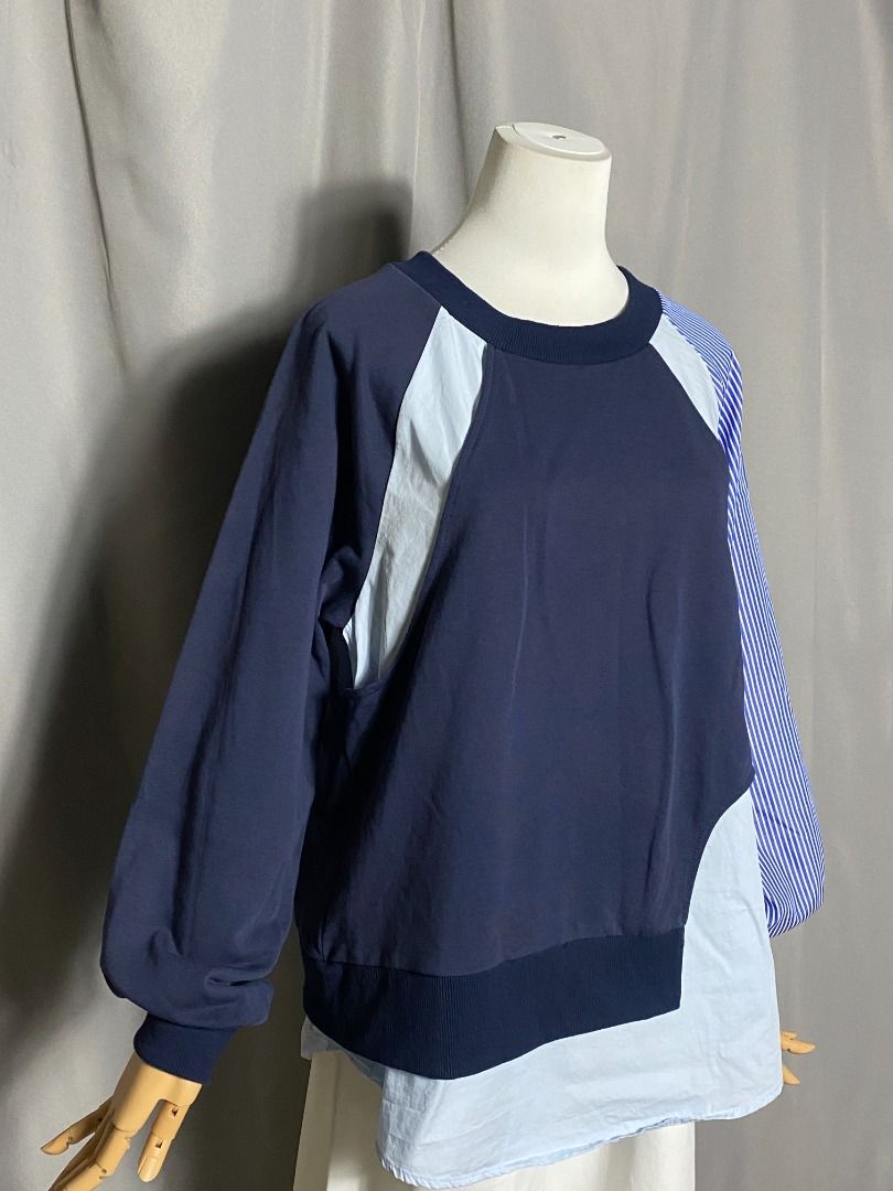 Navy blue and light blue layered-style patchwork sweatshirt with one striped (Category: Longsleeves) located in Las Pinas. Submitted by ipickyou (Listing ID 1459041771, Image 2). Description: Unwashed Condition: 10/10 𝗠𝗲𝗮𝘀𝘂𝗿𝗲𝗺𝗲𝗻𝘁𝘀 𝘄𝗵𝗲𝗻 𝗹𝗮𝗶𝗱 𝗳𝗹𝗮𝘁: -Size M -Armpit to armpit: 21” -Length: 27 1/2”.
