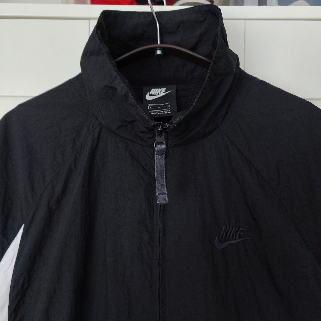 Nike Big Swoosh Windbreaker (Black) (Category: Coats, Jackets and Outerwear) located in Caloocan City. Submitted by thriftdeluxe3305 (Listing ID 1458918232, Image 2). Description: Nike Big Swoosh Windbreaker (Black) Width: 25 Length: 29 Size L on tag --- Color Rate: 10/10 Condition: 9.7/10 (Excellent Condition; small pen marks) *washed and ready to use* --- 3,500php PLUS SHIPPING FEE.