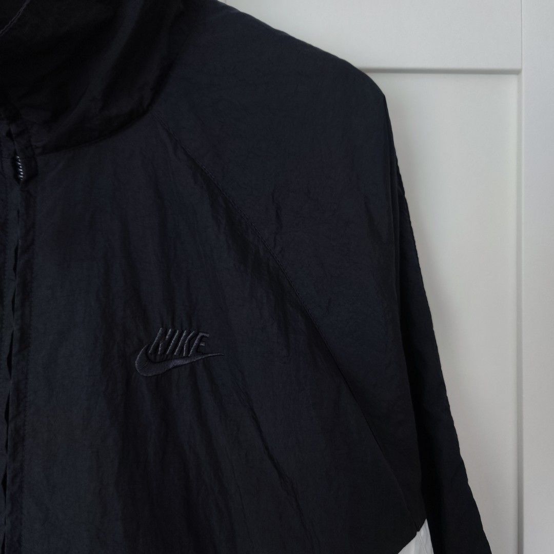 Nike Big Swoosh Windbreaker (Black) (Category: Coats, Jackets and Outerwear) located in Caloocan City. Submitted by thriftdeluxe3305 (Listing ID 1458918232, Image 3). Description: Nike Big Swoosh Windbreaker (Black) Width: 25 Length: 29 Size L on tag --- Color Rate: 10/10 Condition: 9.7/10 (Excellent Condition; small pen marks) *washed and ready to use* --- 3,500php PLUS SHIPPING FEE.