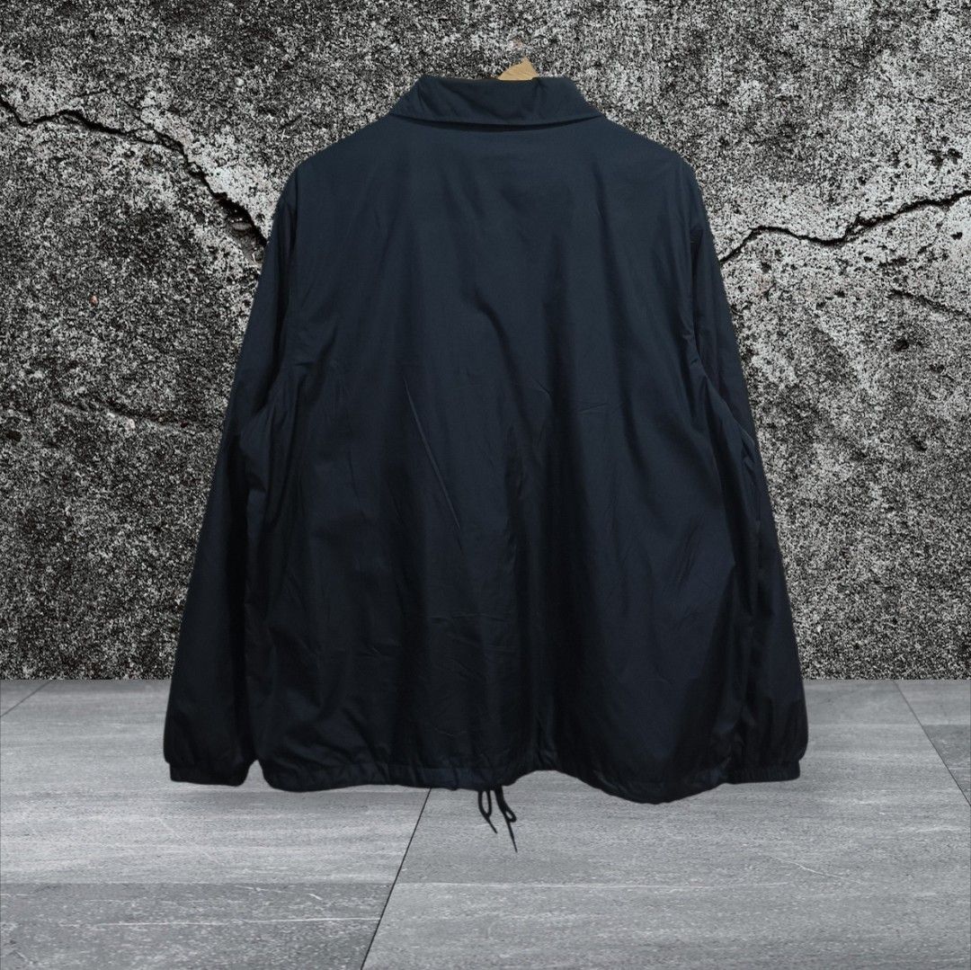 Nike Black Coach Jacket (Category: Coats, Jackets and Outerwear) located in Calatagan. Submitted by lyvertabora (Listing ID 1459016974, Image 3). Description: Dimension:L-28 W-25 Very Good condition excellent sana may dents Yung isang button COLORATE:9.8/10.