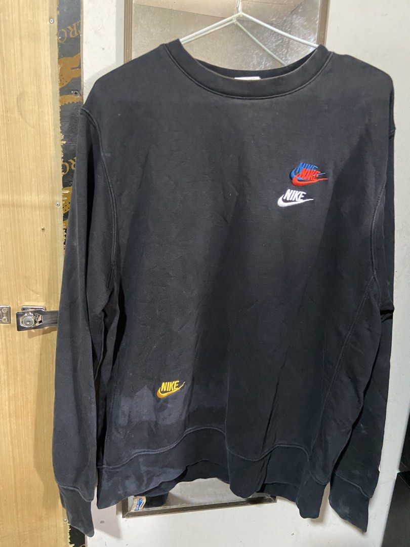Nike Black Crewneck Sweatshirt Size L (Category: Coats, Jackets and Outerwear) located in Quezon City. Submitted by swiftstone.14ff6a (Listing ID 1458940258, Image 1). Description: - Black Nike crewneck sweatshirt - Features multiple Nike logos on the front - Made in Pakistan - Size L - Great for casual wear.