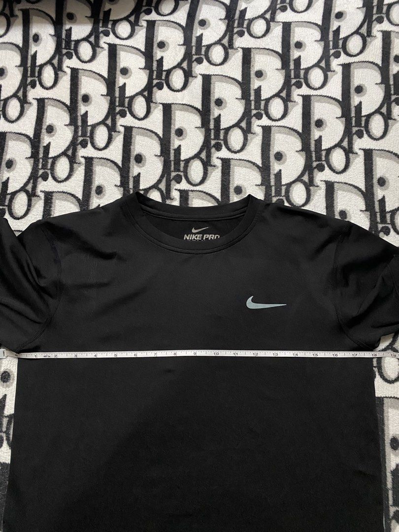 Nike Pro Compression Shirt (Category: Activewear) located in Alfonso. Submitted by clyde.nicole.cerilo1 (Listing ID 1458895268, Image 3). Description: Nike Combat Pro Compression Shirt Size XL On Tag 18 Width 26 Length Complete tags 9/10 Color Rate And Condition Print Deets Cracks On Swoosh Print In Good Condition Overall Payment first Shipped Via J&t Located At Amuyong Alfonso Cavite .
