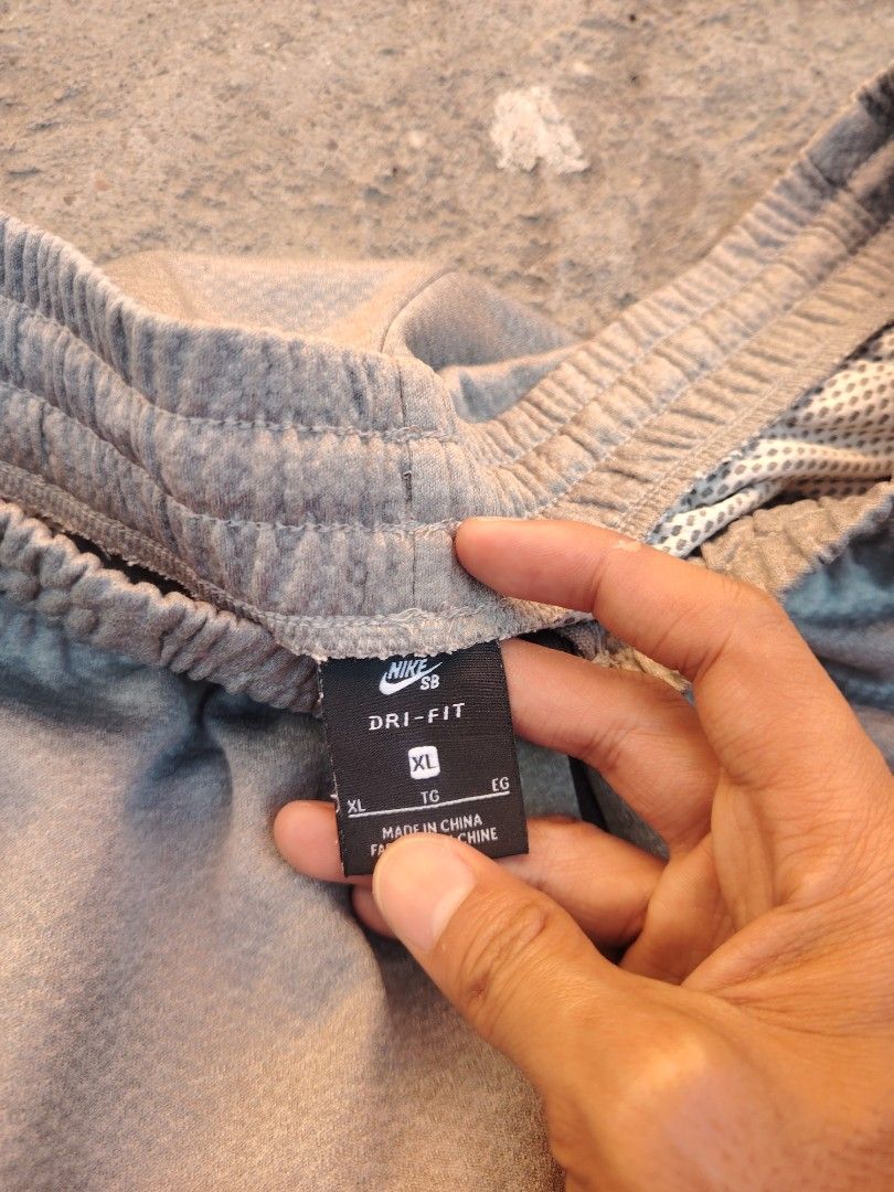 Nike SB Dri-Fit XL Grey Sweatpants (Category: Shorts) located in Calapan. Submitted by thriftopia_12 (Listing ID 1458958713, Image 2). Description: - Grey Nike SB sweatpants - Dri-Fit material - Size XL - Made in China - Elastic waistband - Ideal for casual wear or sports.