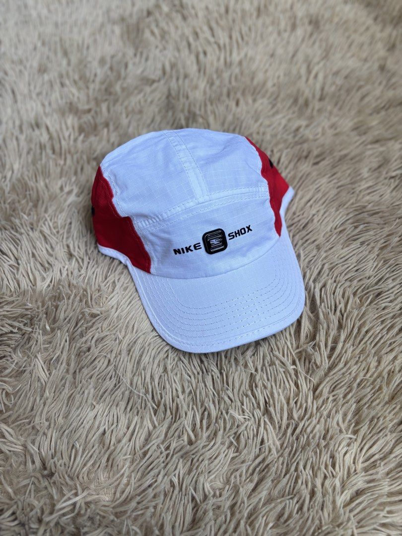 Nike Shox 5 Panel Cap White Red (Category: Caps & Hats) located in Quezon City. Submitted by nojthrift (Listing ID 1459042198, Image 1). Description: - White and red Nike Shox 5 panel cap - Adjustable strap for a comfortable fit - Nike logo featured on the side and back - Ideal for everyday wear or sports activities 700+ship.