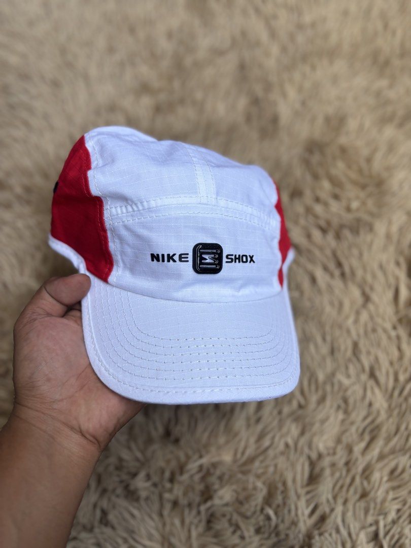 Nike Shox 5 Panel Cap White Red (Category: Caps & Hats) located in Quezon City. Submitted by nojthrift (Listing ID 1459042198, Image 2). Description: - White and red Nike Shox 5 panel cap - Adjustable strap for a comfortable fit - Nike logo featured on the side and back - Ideal for everyday wear or sports activities 700+ship.