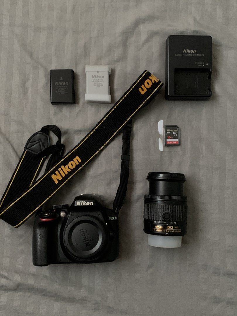 Nikon D3300 DSLR Camera with Manfrotto Tripod (Category: Cameras) located in Manila. Submitted by clevercloud.327838 (Listing ID 1458982824, Image 1). Description: Nikon D3300 for ₱10k - Nikon camera - 18-55mm lens - 2 Batteries - Charger -16 GB SD Card Manfrotto MKCOMPACTACN-BK Compact Action Aluminium Tripod with Hybrid Head, Black for ₱2k -complete set with bag -Max height- 57 inches Can buy separate on this same account: ₱13k for Nikon D3300 