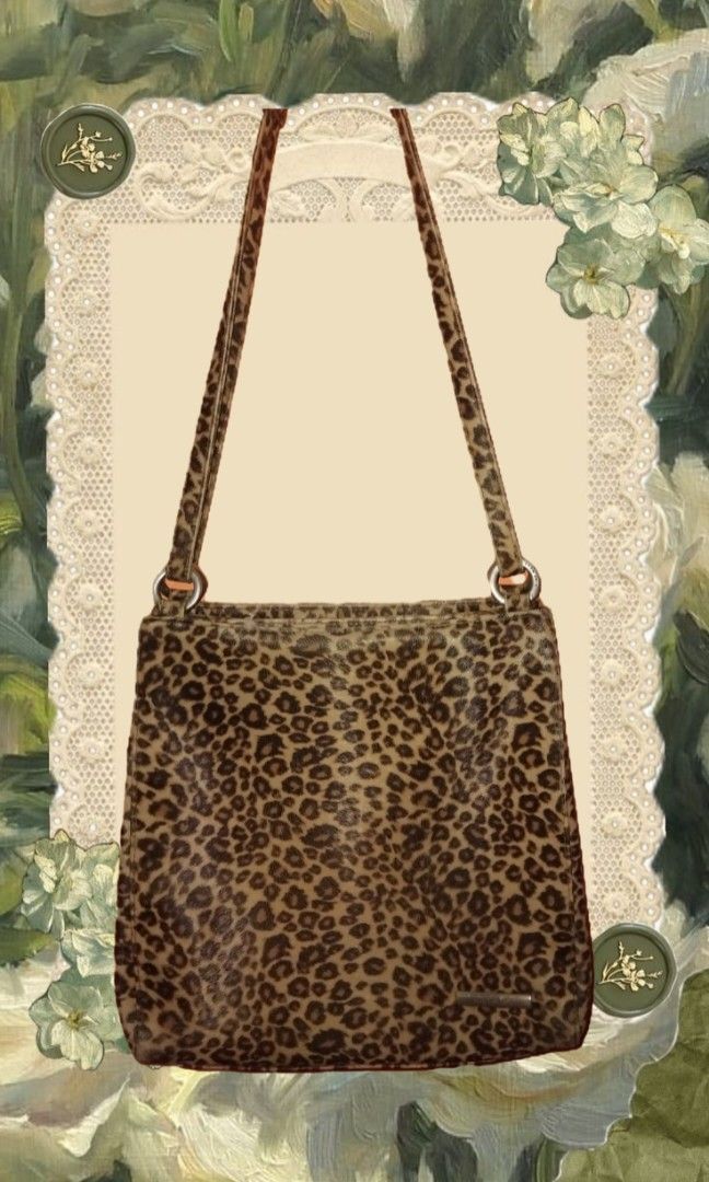 NINE WEST Leopard Print Shoulder Bag (Category: Shoulder Bags) located in Makati City. Submitted by thecarriecollection (Listing ID 1458999840, Image 1). Description: > Lightly used with normal signs of usage Notes: ☆ Shipping fee will be shouldered by buyer ☆ No when worn photos ☆ Price is negotiable ☆ Color is slightly different due to lighting.