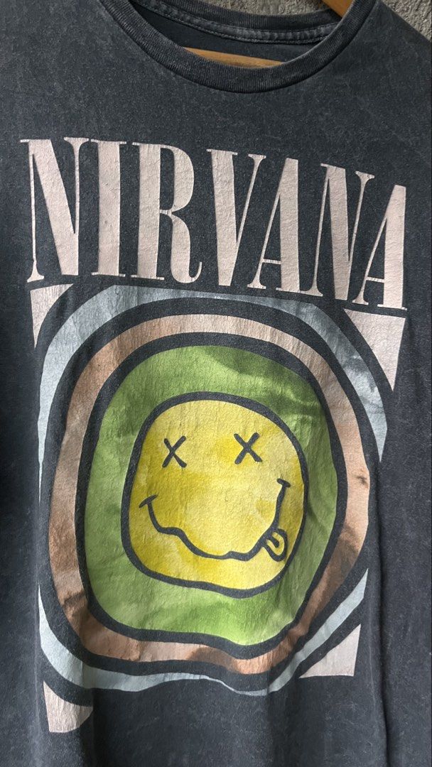 Nirvana Smiley Face T-Shirt XL (Category: Tshirts & Polo Shirts ) located in Cabuyao City. Submitted by bulandos (Listing ID 1459047136, Image 2). Description: - Classic Nirvana smiley face graphic - Washed black with an acid wash look - Size XL - 100% cotton - Made in Dominican Republic - Ideal for any Nirvana enthusiast.