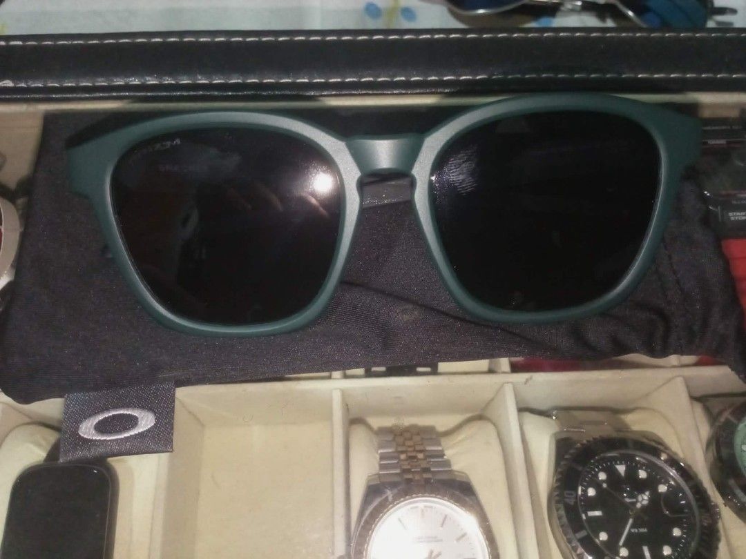 Oakley shades 💯 authentic (Category: Drones) located in Manila. Submitted by keenwater.bd1b52 (Listing ID 1458920739, Image 1). Description: selling my Oakley shades for only 2300 slightly negotiable location qc or Caloocan area always online.