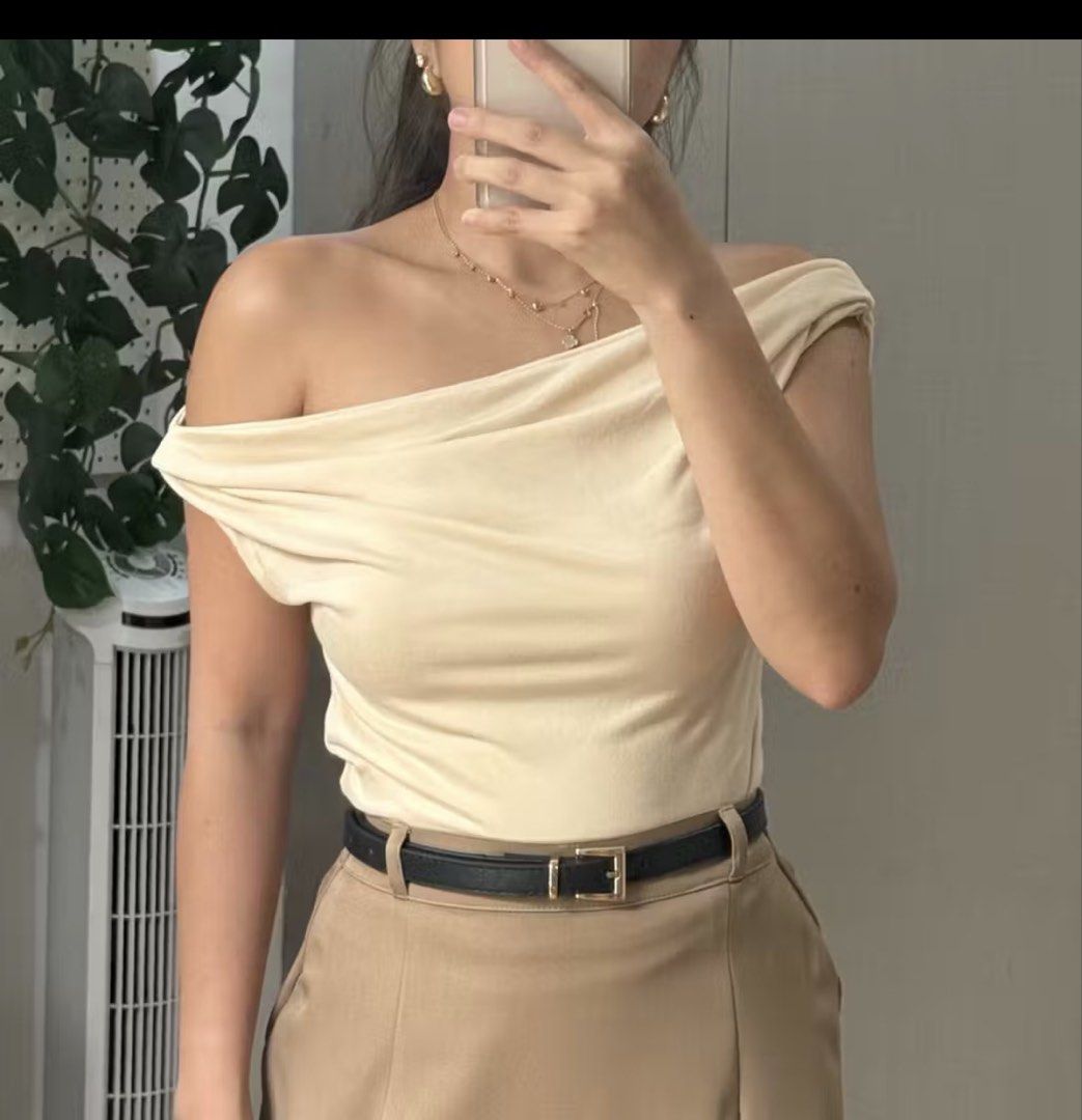 Off Shoulder Drape Tops (2 Colors) (Category: Blouses) located in Mandaluyong City. Submitted by chubs08 (Listing ID 1459028073, Image 3). Description: - 250/each. 400/2pcs -Set of 2 off-shoulder drape tops - Colors: Light Beige and Taupe Brown - Material: Soft and stretchy fabric for comfort - Perfect for dressing up or down - Effortlessly stylish and comfortable.