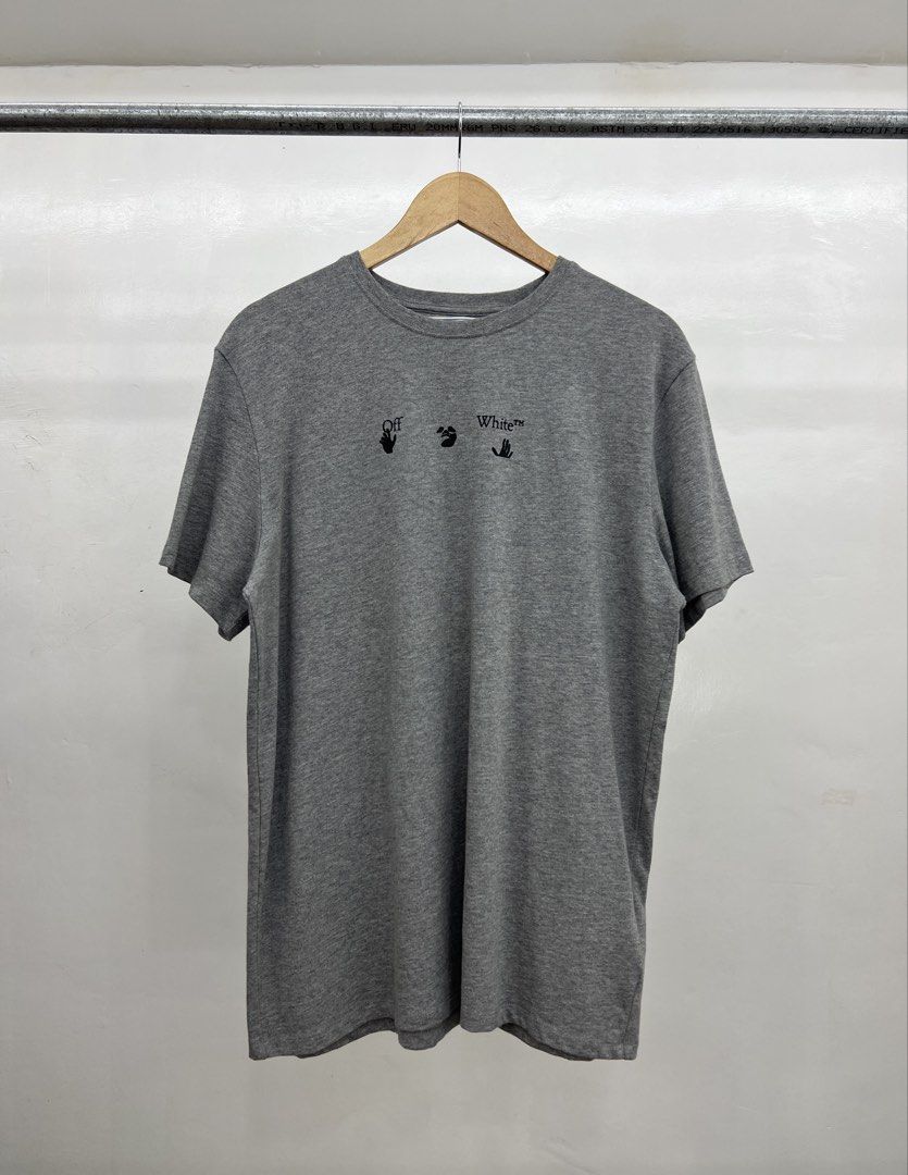 Off-White Grey Drip Arrow T-Shirt (Category: Tshirts & Polo Shirts ) located in Koronadal. Submitted by southloots. (Listing ID 1459051939, Image 1). Description: - Authentic Grey Off-White T-Shirt - Iconic drip arrow graphic on the back - Small Off-White logo on the front chest - Made with quality fabric for comfort - Ideal for everyday casual wear - Authenticity guaranteed: Check tags & scan QR code for verification.