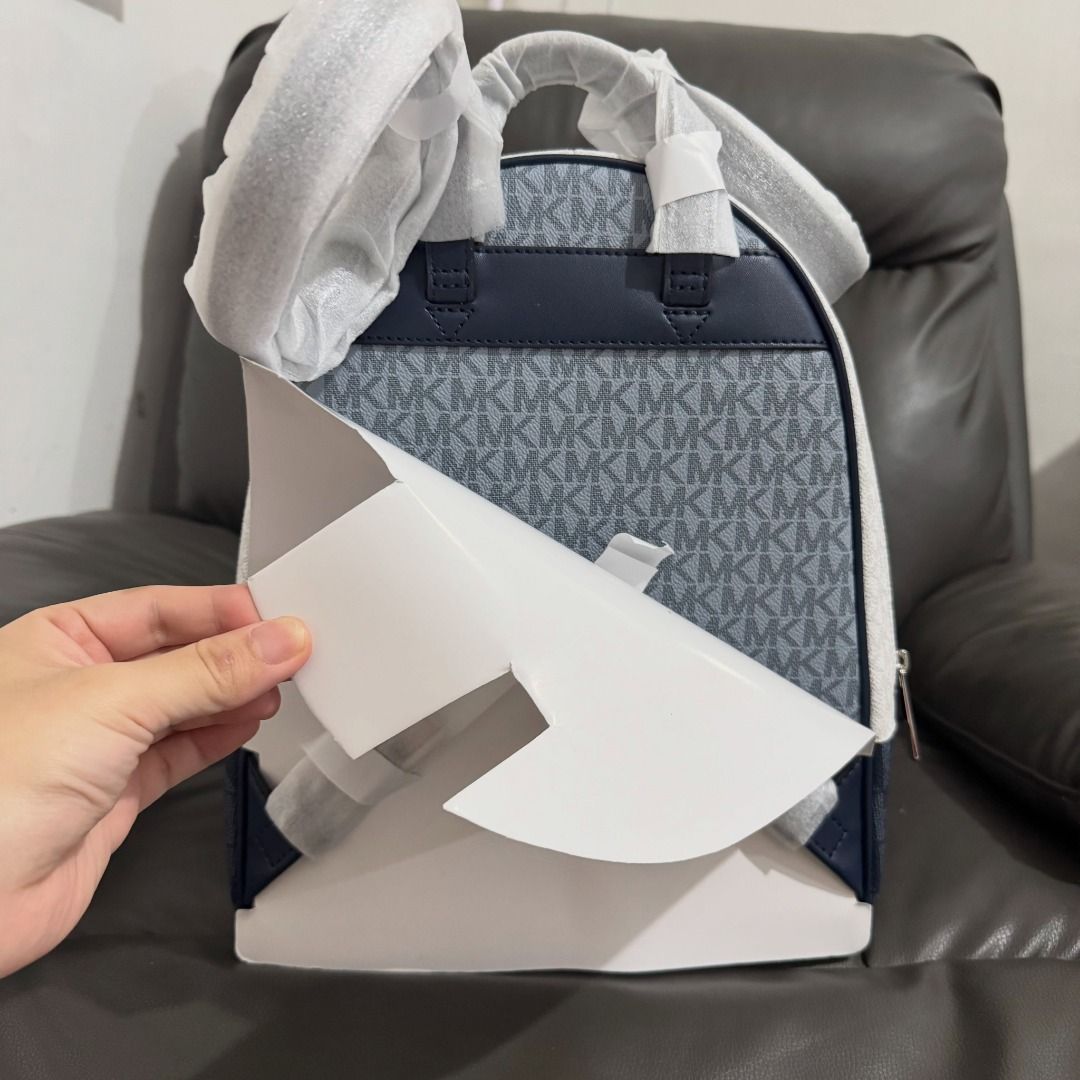 Original and Brandnew MIK0RS Rhea Backpack (Category: Backpacks) located in Quezon City. Submitted by mjmassortedfinds (Listing ID 1458904682, Image 3). Description: MIK0RS Rhea Backpack 8 7 9 9 +sf Details: * Zip fastening * Logo-print canvas * Silver-tone hardware * Exterior: front zip pocket * Interior: back zip pocket * Lining: 100% polyester * Size: (H)32.3cm x (W)26.6cm x (D)12.7cm * 89.4% coated canvas/9.6% polyester/1% polyurethane ✅ 0rig