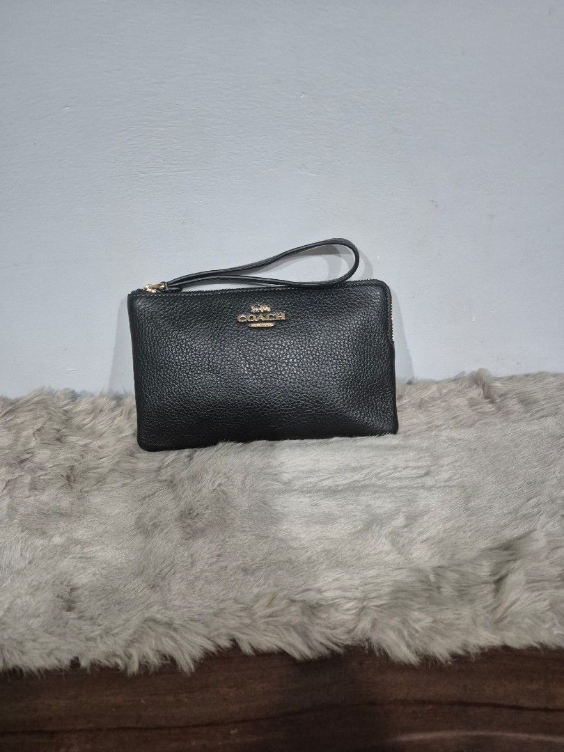 Original Coach Large Wristlet (Category: Wallets & Card holders) located in Cavite. Submitted by chaellebrandsluxe (Listing ID 1458935105, Image 1). Description: selling very low Large No inclusion LP posted already.