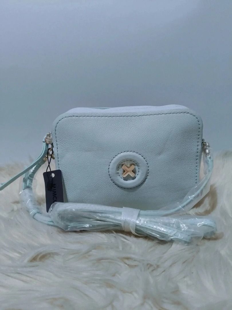 Original MIMCO (Category: Cross-body Bags) located in Cabuyao City. Submitted by your____lux____shop (Listing ID 1458972232, Image 1). Description: Sale! Brand New condition Original MIMCO small size Pure genuine leather flawless w/ provided dustbag 📌First to pay.