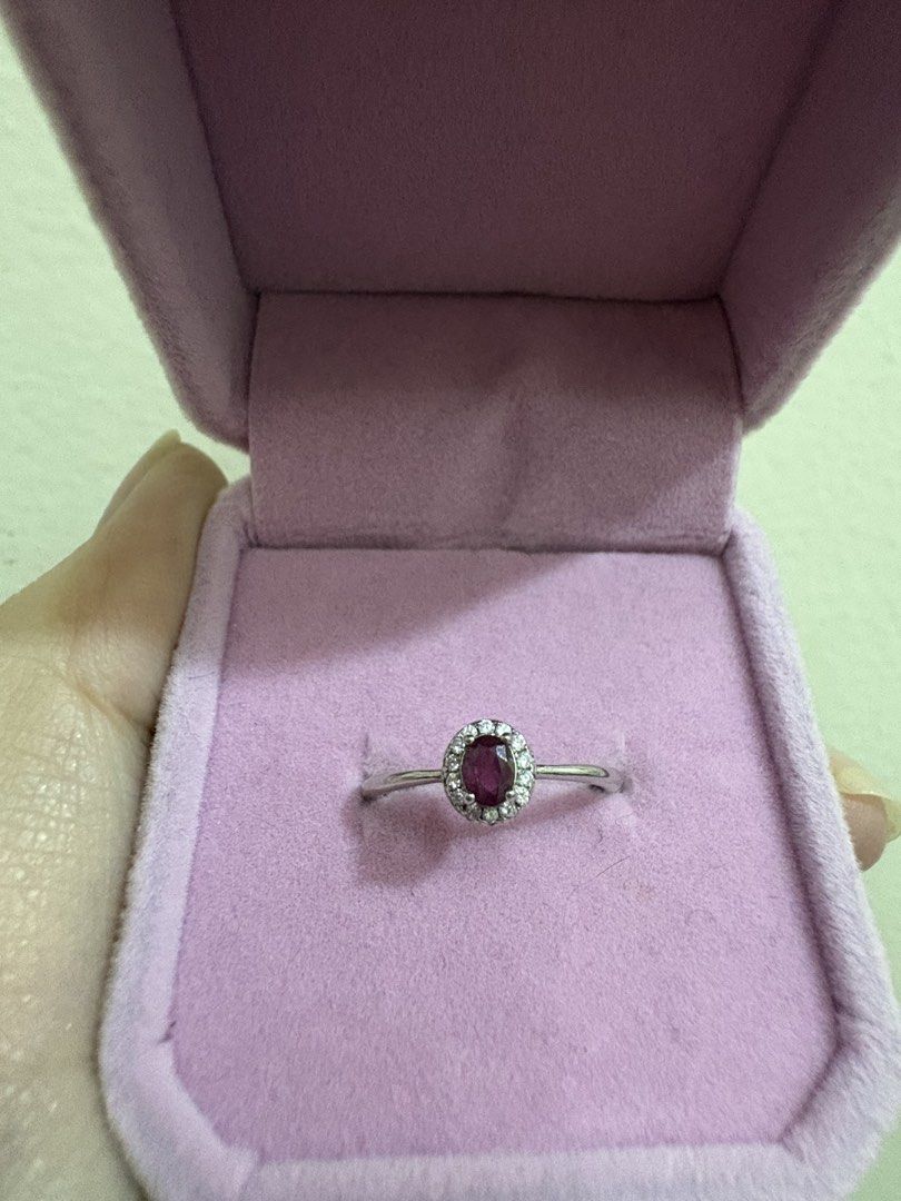Oval Ruby Ring in Silver S925 (Category: Rings) located in Manila. Submitted by alyannaros79007 (Listing ID 1458983096, Image 2). Description: - Beautiful oval ruby center stone - Surrounded by small stones - Adjustable Ring size - S925 Silver band - Perfect for gifting or personal indulgence.