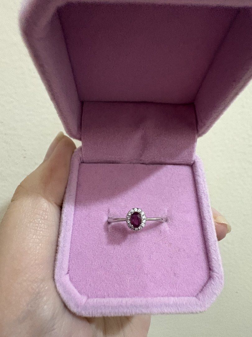 Oval Ruby Ring in Silver S925 (Category: Rings) located in Manila. Submitted by alyannaros79007 (Listing ID 1458983096, Image 1). Description: - Beautiful oval ruby center stone - Surrounded by small stones - Adjustable Ring size - S925 Silver band - Perfect for gifting or personal indulgence.