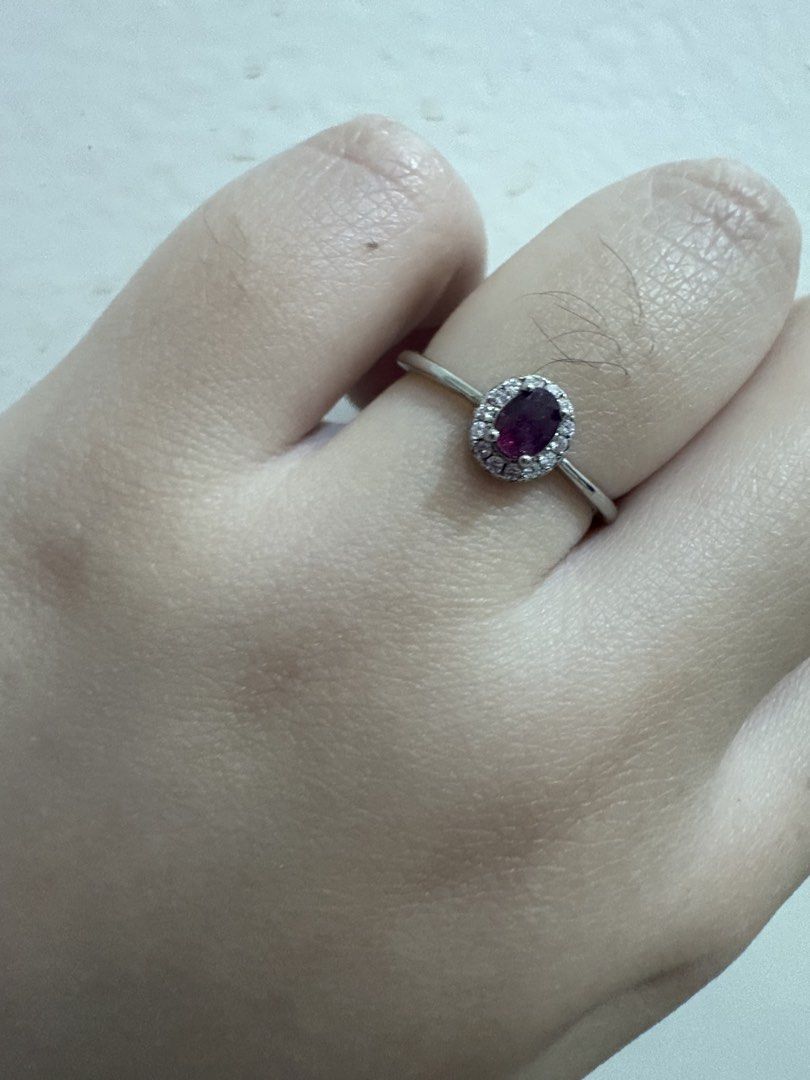 Oval Ruby Ring in Silver S925 (Category: Rings) located in Manila. Submitted by alyannaros79007 (Listing ID 1458983096, Image 3). Description: - Beautiful oval ruby center stone - Surrounded by small stones - Adjustable Ring size - S925 Silver band - Perfect for gifting or personal indulgence.