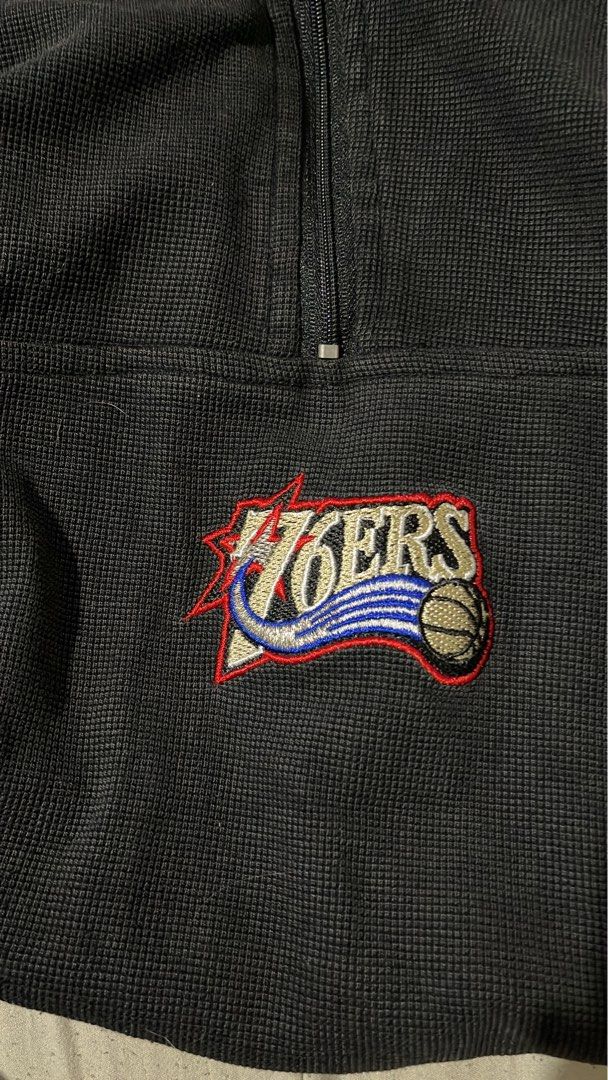 Philadelphia 76ers NBA Quarter Zip Pullover Sweatshirt (Category: Coats, Jackets and Outerwear) located in Mandaluyong City. Submitted by mark2pac (Listing ID 1458956063, Image 2). Description: - Black and red quarter zip pullover sweatshirt - Features embroidered Philadelphia 76ers logo on the chest - Includes a smaller 76ers logo patch on the lower left side - NBA branding visible on the inner collar - Small NBA logo tag on the side - Ideal for