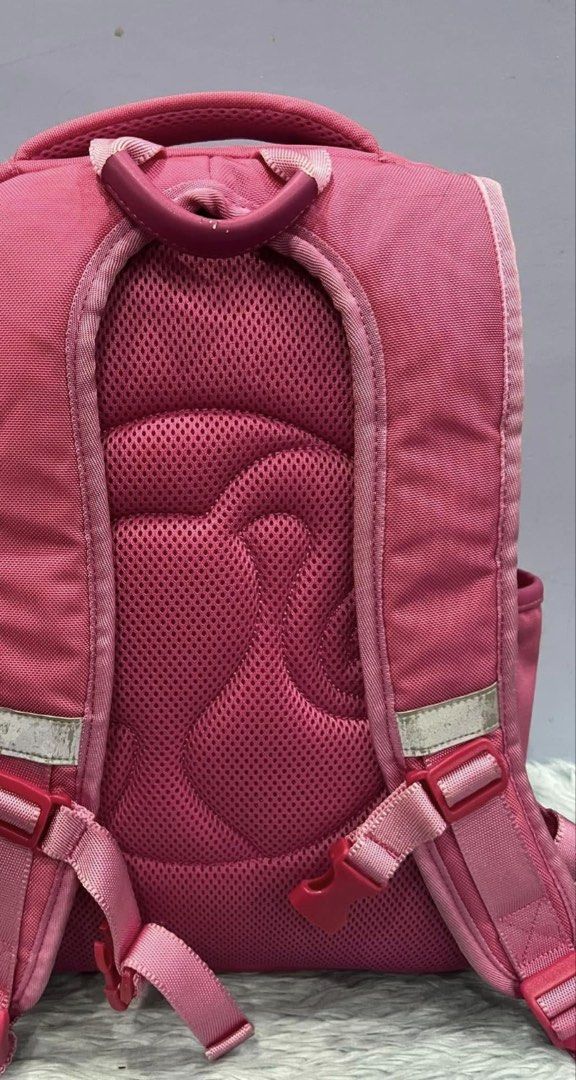 Pink Barbie Backpack (Category: Backpacks) located in Lapu Lapu. Submitted by cecillia07 (Listing ID 1458992715, Image 3). Description: - Adorable pink backpack featuring the iconic Barbie logo. - Multiple compartments and zippers for organized storage. - Padded straps and back ensure maximum comfort. - Perfect for school, travel, or everyday use. - Fun Barbie-themed zipper tags add a special touch. - Protective feet on the bottom to keep it clea