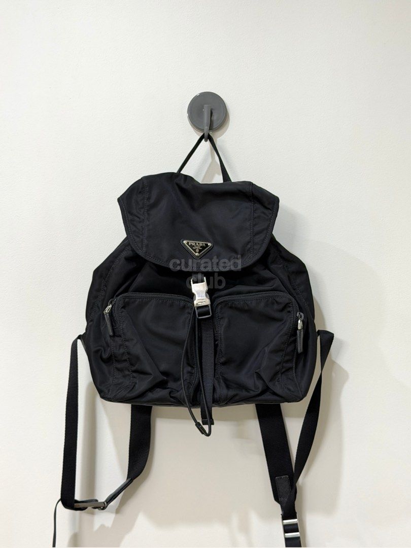 Preloved ★ PRADA Re-Nylon Black Drawstring Backpack (Category: Luxury Bags & Wallets) located in San Juan City. Submitted by curated.club (Listing ID 1459038944, Image 1). Description: ★ authenticated by LegitGrails—authenticity certificate included ★ please read bio and last slide of this listing before ordering ★ actual item color may differ slightly due to lighting and screen settings ★ bag only—no original inclusions; generic drawstring bag w