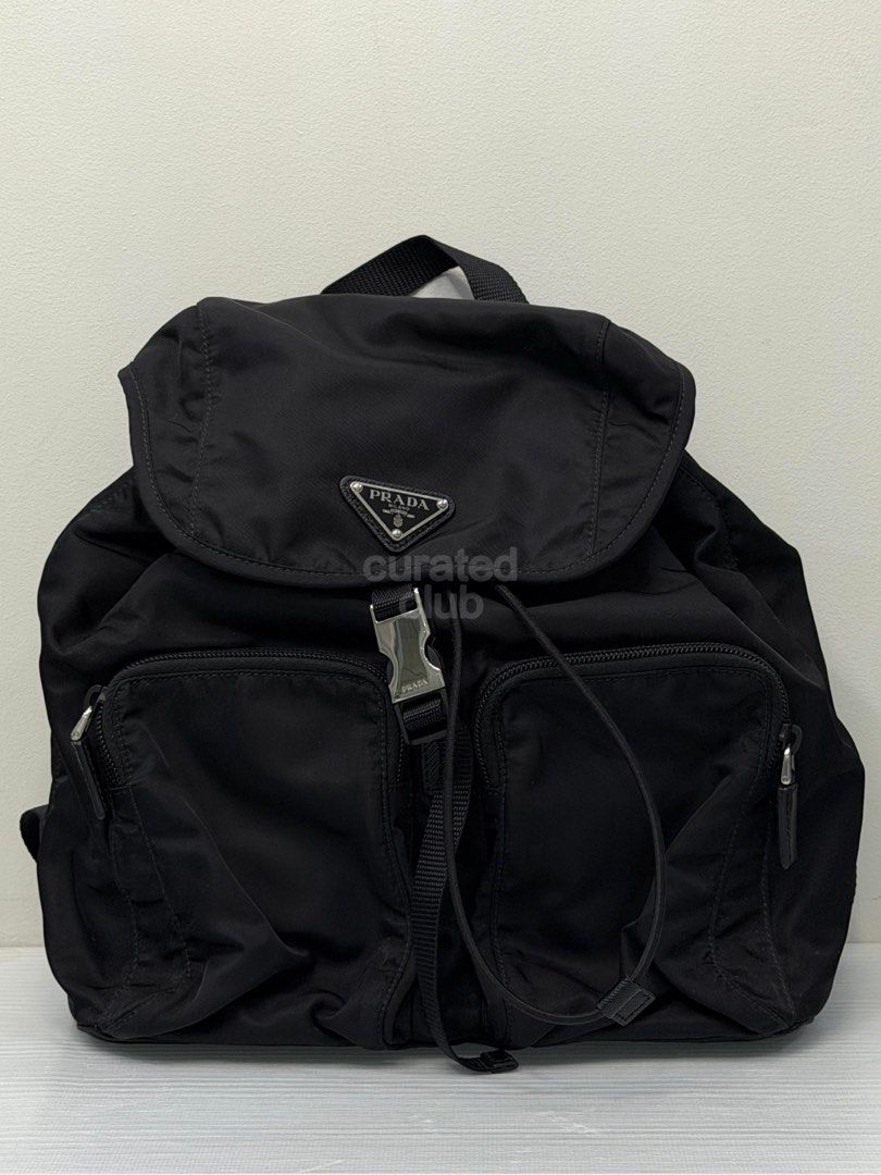 Preloved ★ PRADA Re-Nylon Black Drawstring Backpack (Category: Luxury Bags & Wallets) located in San Juan City. Submitted by curated.club (Listing ID 1459038944, Image 3). Description: ★ authenticated by LegitGrails—authenticity certificate included ★ please read bio and last slide of this listing before ordering ★ actual item color may differ slightly due to lighting and screen settings ★ bag only—no original inclusions; generic drawstring bag w