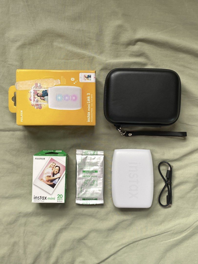 fujifilm instax mini link 3 smartphone printer bundle (clay white) (Category: Printers, Scanners & Copiers) located in Davao. Submitted by editd (Listing ID 1458957732, Image 1). Description: like new / excellent condition (super smooth & 100% working) color: clay white inclusions: full complete set with original box + manual, hard travel case organizer, usb charging cable & unopen 30-sheet film pack (2027 exp) note: accessories are well kept & r