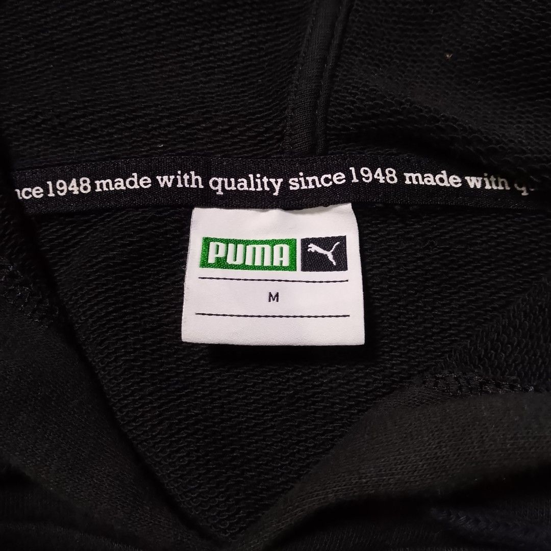 Puma Hoodie (Category: Coats, Jackets and Outerwear) located in Taguig. Submitted by 8kthrifter (Listing ID 1459084964, Image 2). Description: Size: Medium Width: 24 Length: 24.5 Color Rate: 9.5/10 Issue: minor stains (see last 4 photo) Excellent Condition.