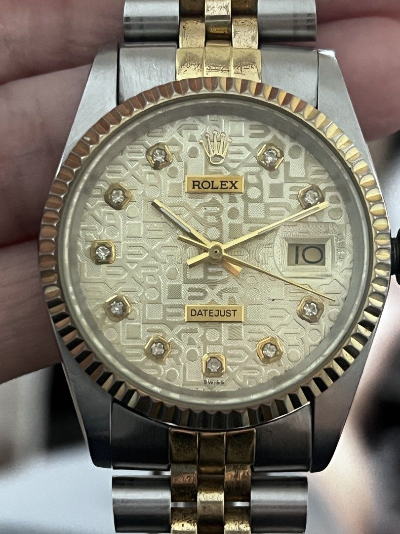 Rolex Datejust Two-Tone Diamond Dial Watch (Category: Luxury Watches) located in Muntinlupa City. Submitted by cerealrn (Listing ID 1458906650, Image 1). Description: - Authentic Rolex Datejust - Two-tone: Stainless Steel & Gold - Patterned Dial with Diamond Hour Markers - Fluted Bezel - Date Window at 3 o'clock - Jubilee Bracelet with Folding Clasp - Clasp Serial Number: S11 62523H-19 - Rolex Logo on Crown.