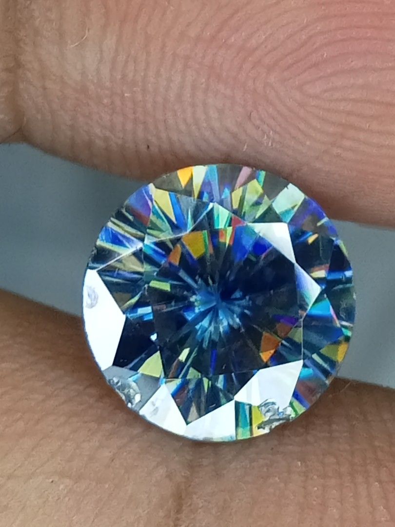 Round Cut Gemstone with Rainbow Fire (Category: Precious Stones) located in Davao. Submitted by kimpoycaye62726 (Listing ID 1459073522, Image 2). Description: - Sparkling round cut gemstone - Exhibits brilliant rainbow fire and flash - Ideal for jewelry making or as a collector's item - Ready for its new home.