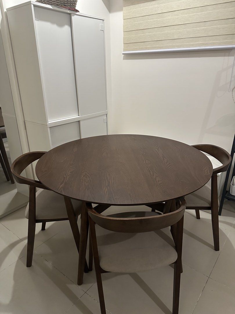 Round Solid Wooden Dining Table with 3 Chairs Blims Seki (Category: Tables & Sets) located in Marikina City. Submitted by ellies.mnl (Listing ID 1458922423, Image 3). Description: FOR SALE: Solid Wood Dining Table + 3 Chairs from Blims (Seki dining set) 💰 Bought for: ₱34,950 🏷️ Selling for: ₱22,000 RFS: Need a smaller set after moving to the condo Table diameter -120 cm Chair width - 55 cm Table and chair height - 77 cm Inclusions: • 1 solid wo