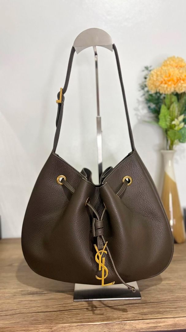 Saint Laurent Drawstring Bucket Bag (Category: Luxury Bags & Wallets) located in Caloocan City. Submitted by lovelj_2026 (Listing ID 1459060850, Image 1). Description: Another YSL baby ♡♡ Must have din ito bagelya na ito mga sis 🤎🤎 Perfect for everyday use nating mga girlies 👜👜 Available @ very low price in the market ☑☑ for only P✖,✖✖✖, you can have it yours ✨✨ 💯% japan sources bag 🎌🎌 ✅✅ Carefully selected and screened by our trusted sour