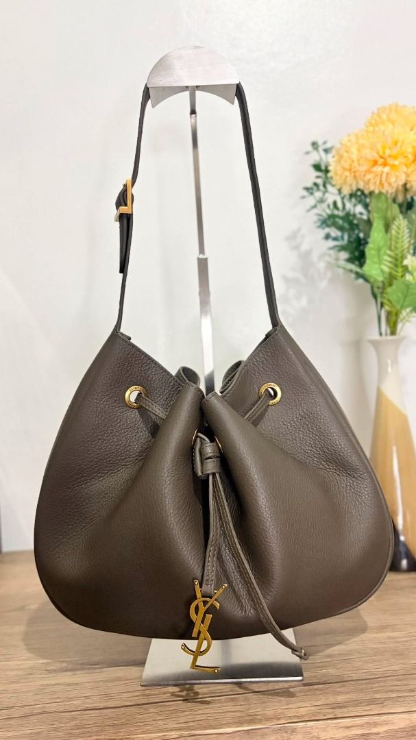 Saint Laurent Drawstring Bucket Bag (Category: Luxury Bags & Wallets) located in Caloocan City. Submitted by lovelj_2026 (Listing ID 1459060850, Image 2). Description: Another YSL baby ♡♡ Must have din ito bagelya na ito mga sis 🤎🤎 Perfect for everyday use nating mga girlies 👜👜 Available @ very low price in the market ☑☑ for only P✖,✖✖✖, you can have it yours ✨✨ 💯% japan sources bag 🎌🎌 ✅✅ Carefully selected and screened by our trusted sour