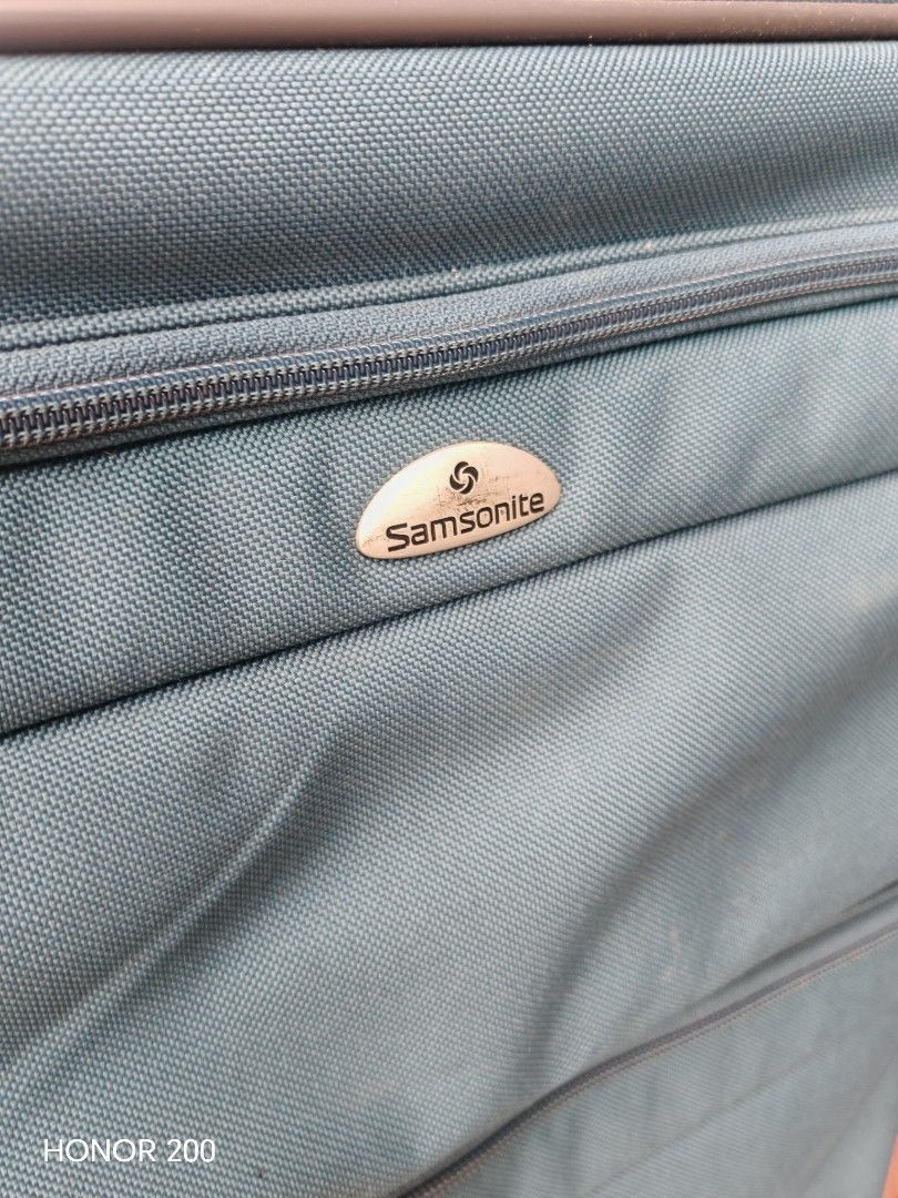 Samsonite Teal Expandable Suitcase Luggage (Category: Luggage) located in Manila. Submitted by mariceloch01539 (Listing ID 1458895516, Image 2). Description: - Samsonite teal suitcase - Expandable design for extra packing space - Two front zippered pockets - Interior straps to secure belongings - Wheels for easy transport - Approximate dimensions: 24 inches (height) x 16 inches (width).
