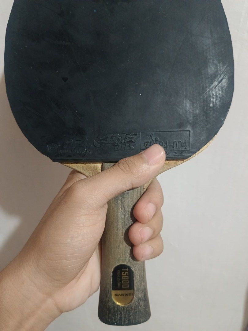 Sanwei t5000 Table Tennis Racket (Category: Racket and Ball Sports) located in Escalante. Submitted by _shopwithz (Listing ID 1459040287, Image 3). Description: 📍visayas FREE CASE FREE SHIPPING if kunin as 1,400 NO FREE SHIPPING kapag tatawad details: blade - Sanwei T500 rubber - DHS PF4 and YINHE MOON MAX TENSE .