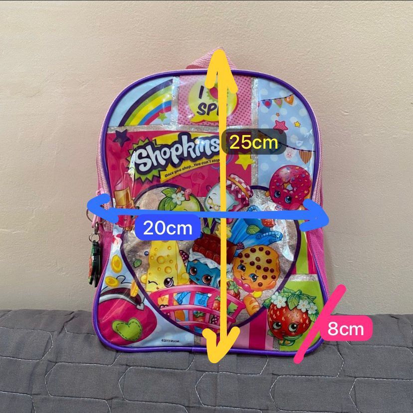 Shopkins Small Backpack (Category: Other Babies Going Out Needs) located in Imus. Submitted by shopfromlilo (Listing ID 1426508800, Image 3). Description: Well-used. Please manage expectations. Needs washing. With free Shopkins keychains. Imus Cavite location. Lalamove or J&T. #shopkins #shopkinsbag #kidsbag #kidsbackpack.